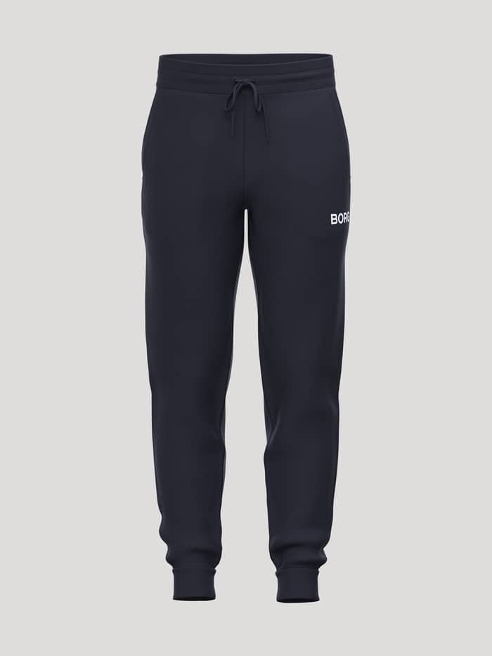 Borg Essential 3 Tapered Sweatpants in Night sky (Navy) featuring a white logo, drawstring waist, and tapered legs.