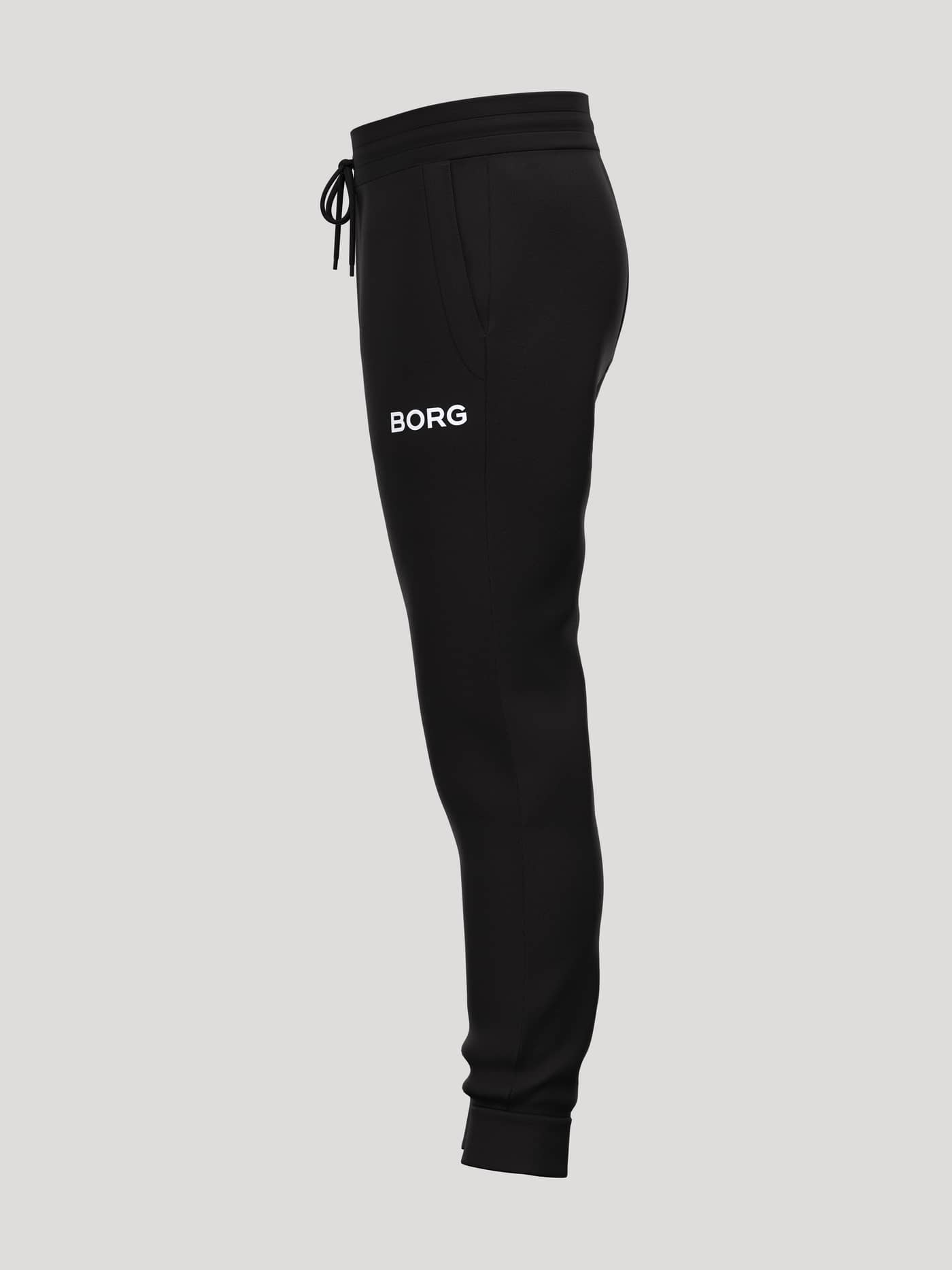 Side view of Borg Essential 3 Tapered Sweatpants in Black Beauty (Black) with a white logo and tapered legs for tennis. - Image 3