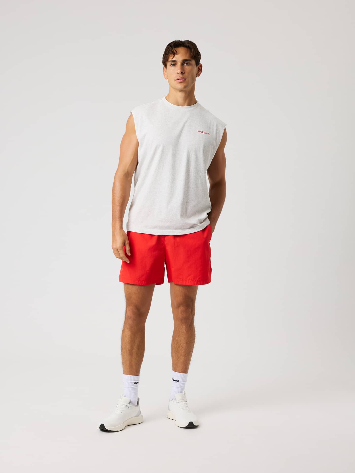 Borg Gym Sleeveless T-Shirt in Ultra Light Grey Melange (Grey) with a red logo, in a full-body view for training. - Image 4