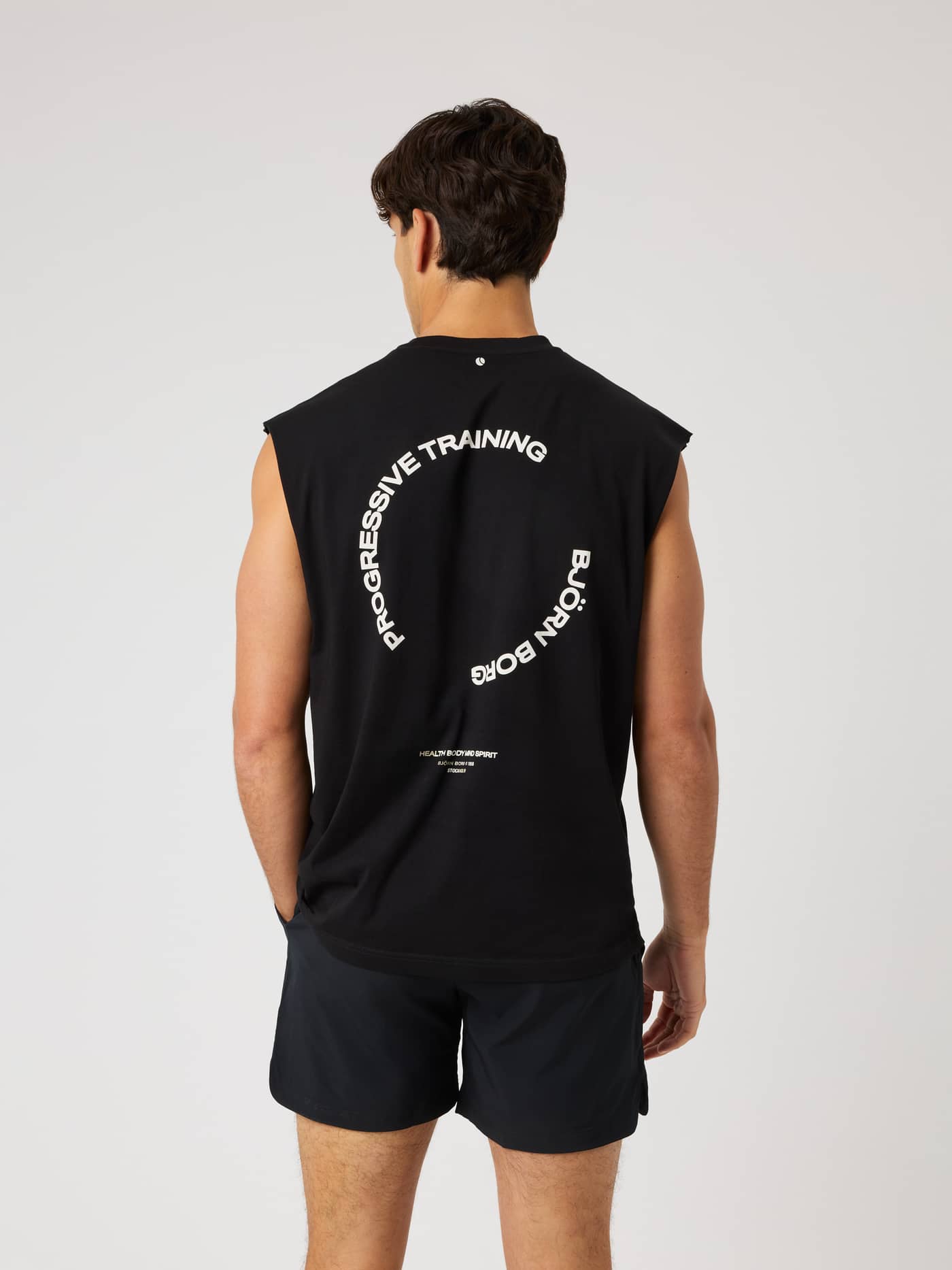 Back view of the Borg Gym Sleeveless T-Shirt in Black Beauty (Black), with a white training logo and tennis ball print. - Image 2
