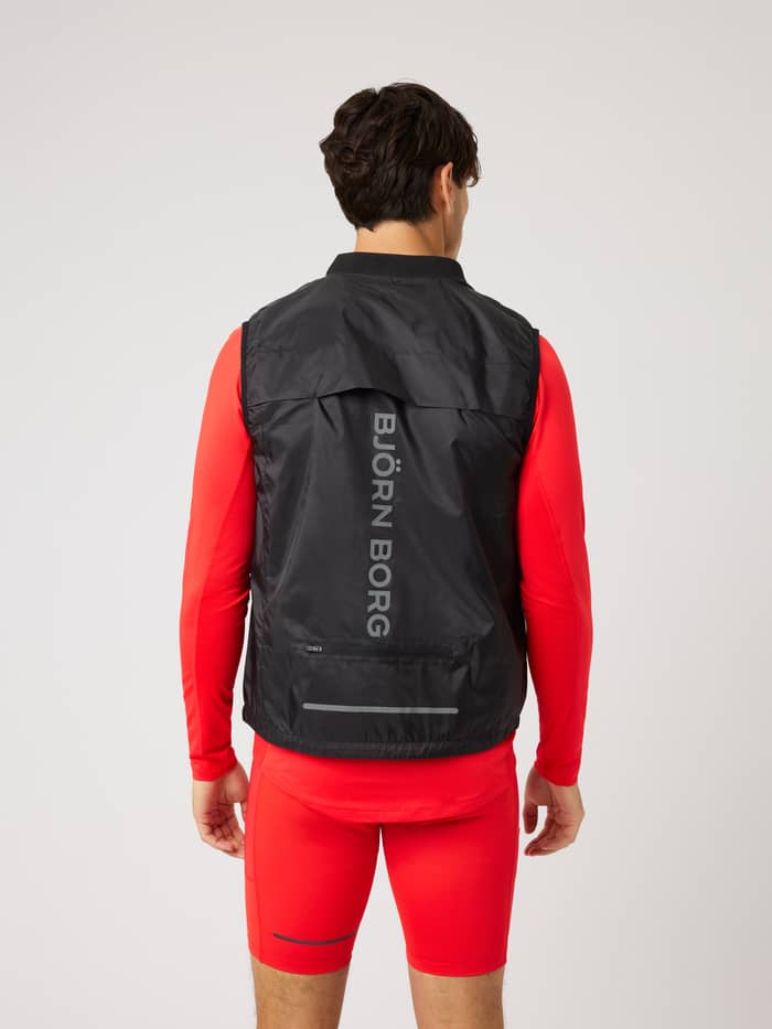 Rückansicht der Borg Performance Vest in Black Beauty (Schwarz) mit silbernem vertikalem Logo zum Laufen. - Image 2