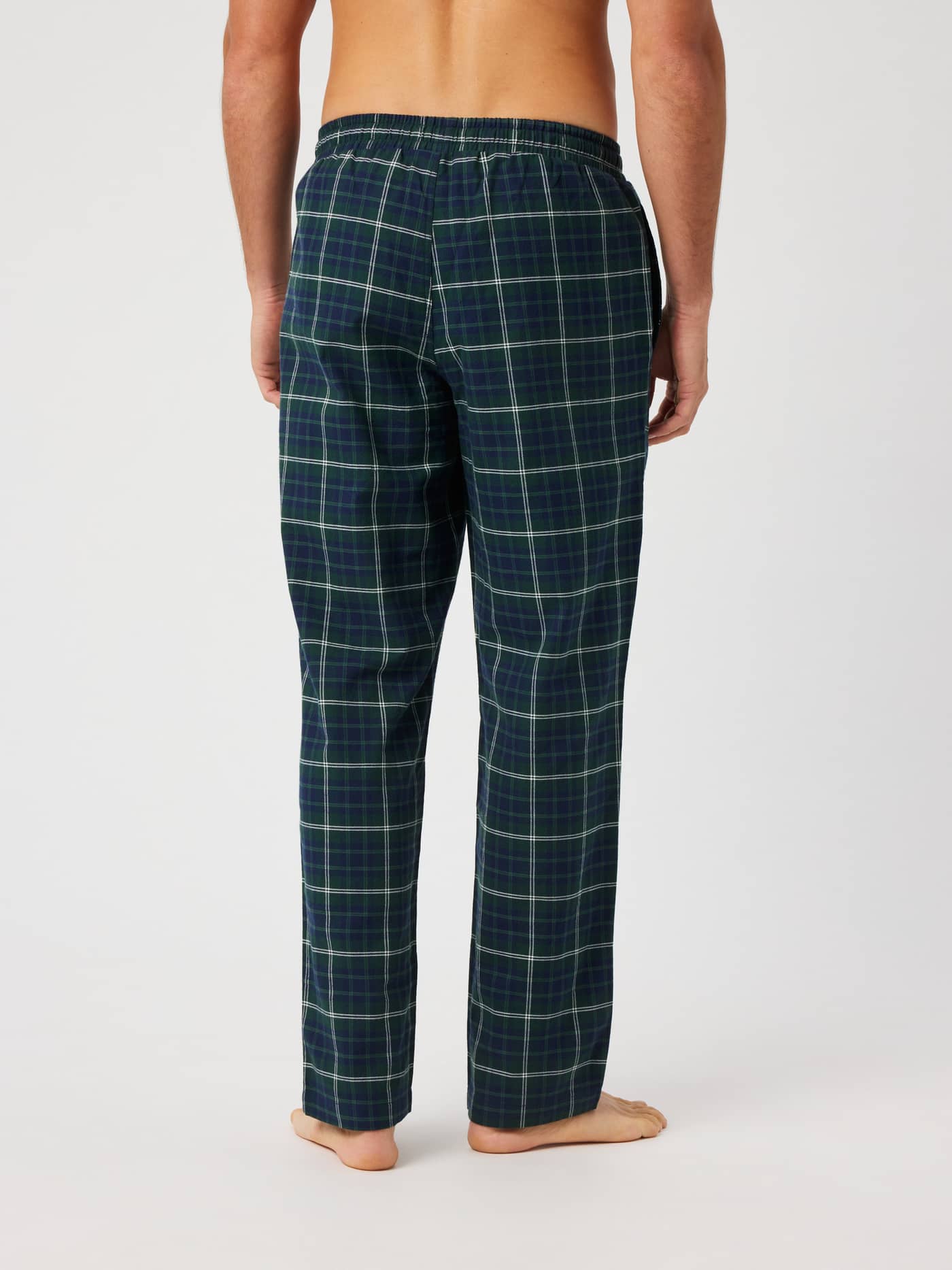 Back view of the Core Flannel Pyjama Pants in a tartan check pattern, showcasing the relaxed fit and elastic waistband. - Image 2