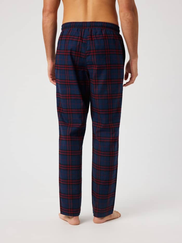 Back view of the Core Flannel Pyjama Pants featuring a blue and red tartan pattern.