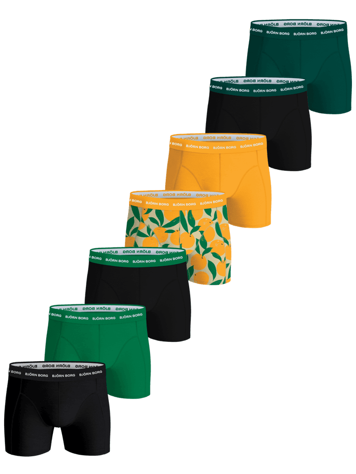 Cotton Stretch Boxers 7-pack in black, green, orange, and fruit print boxer briefs with white Björn Borg logo waistbands.