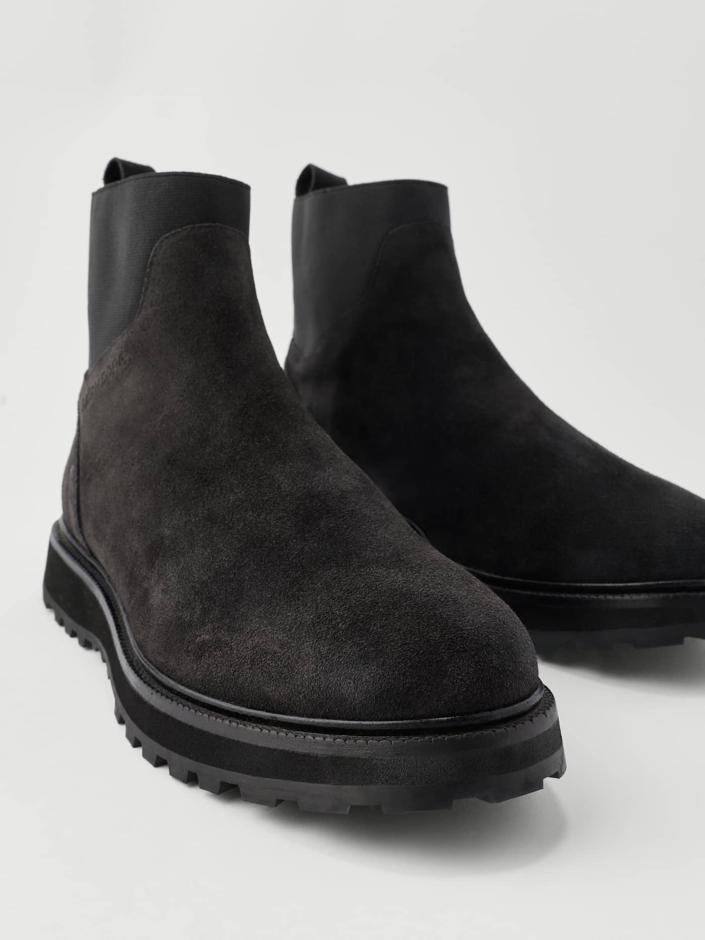Men's Summit Chelsea Boots in Black featuring a premium suede texture and a thick, durable lug sole. - Image 4