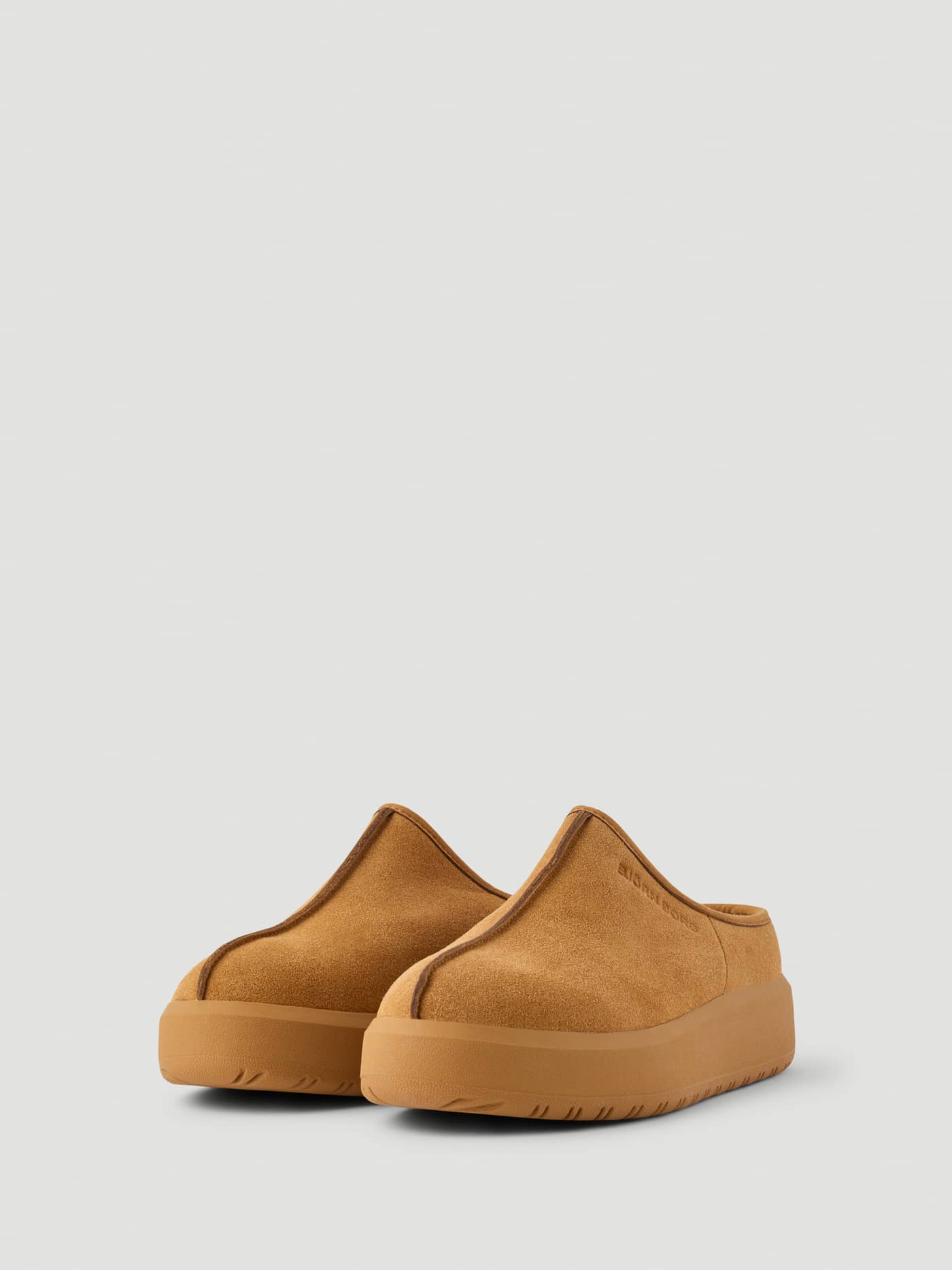Women's Wooly Clog Boots in Brown featuring a soft textured finish, tonal logo, and chunky platform soles. - Image 2