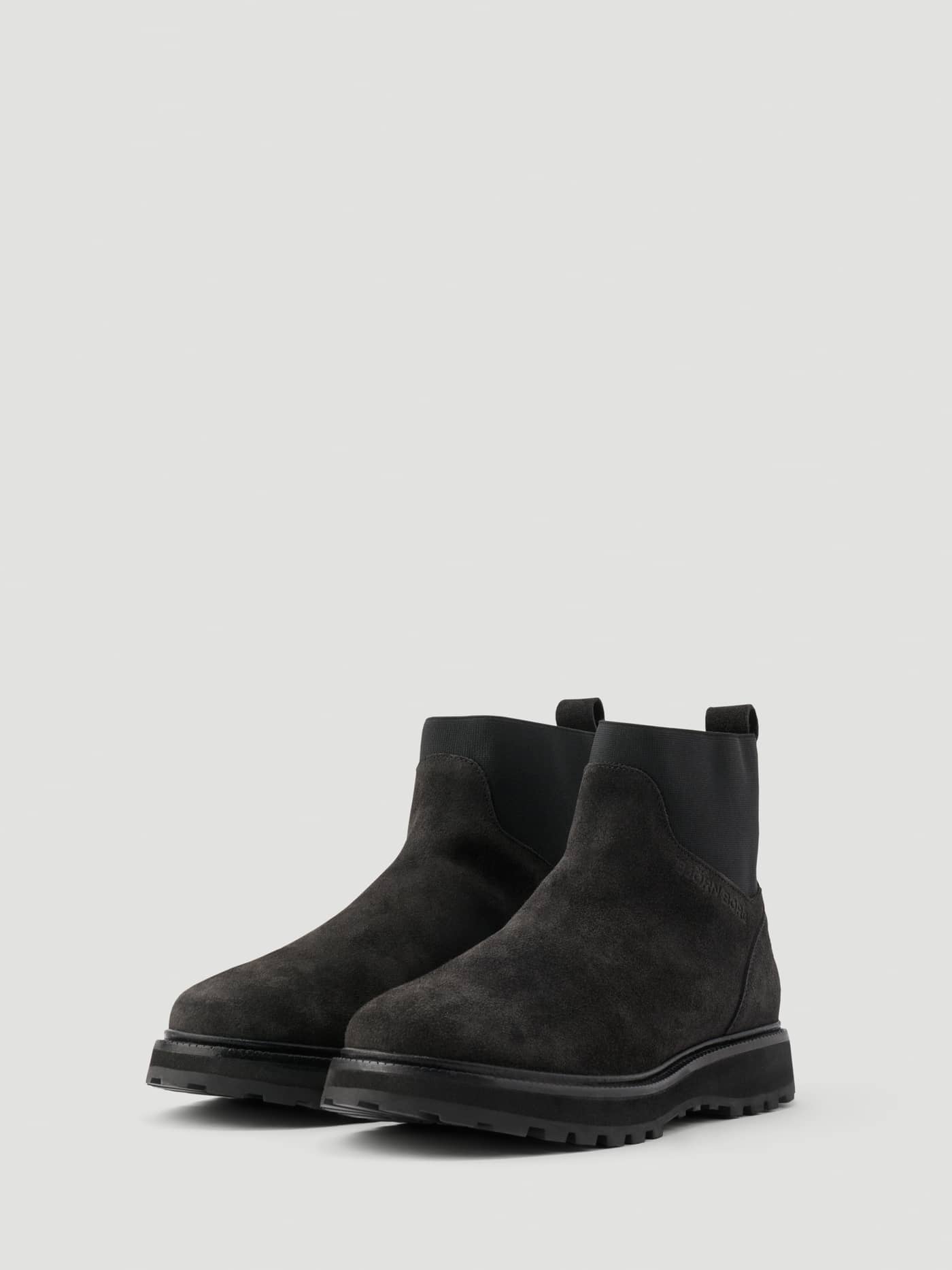 Women's Summit Chelsea Boots in Black leather featuring a chunky lug sole and tonal debossed side logo. - Image 2