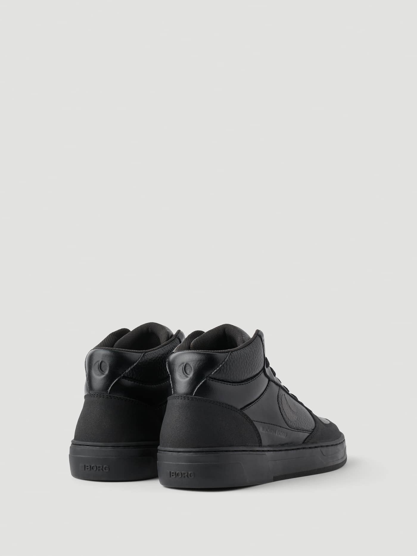 Men's Challenger Mid Sneakers in Black synthetic leather, featuring a back view with tonal logos and tennis-inspired style. - Image 3