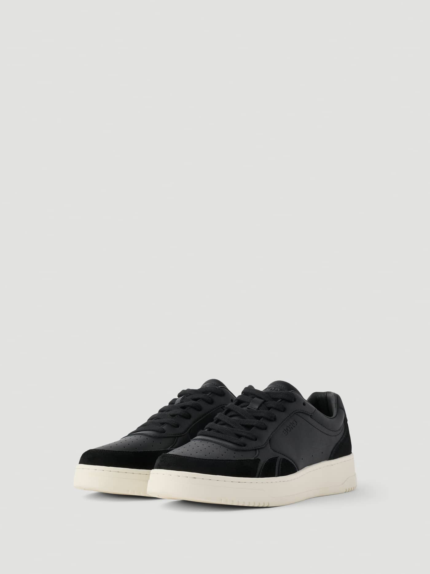Men's Victory Leather Sneakers in Black with a tennis-inspired silhouette and premium leather panels on a white sole. - Image 2