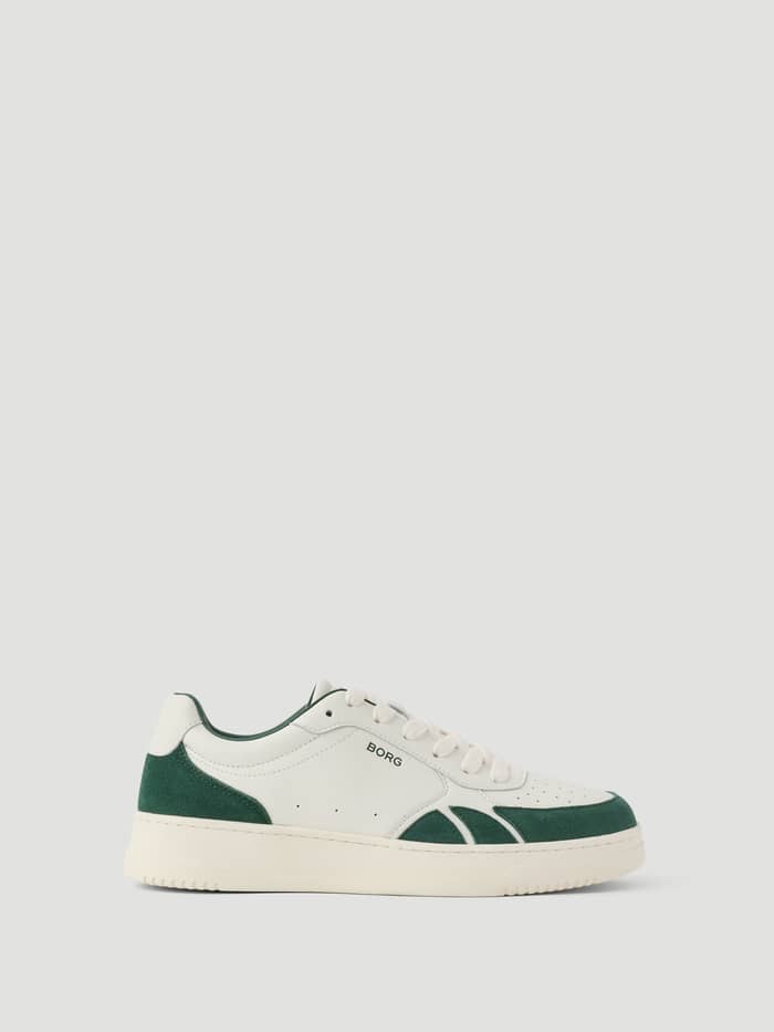 Women's Victory Leather Sneakers i Vit och Grön sedda från sidan med en svart logo för en premium tennisstil.