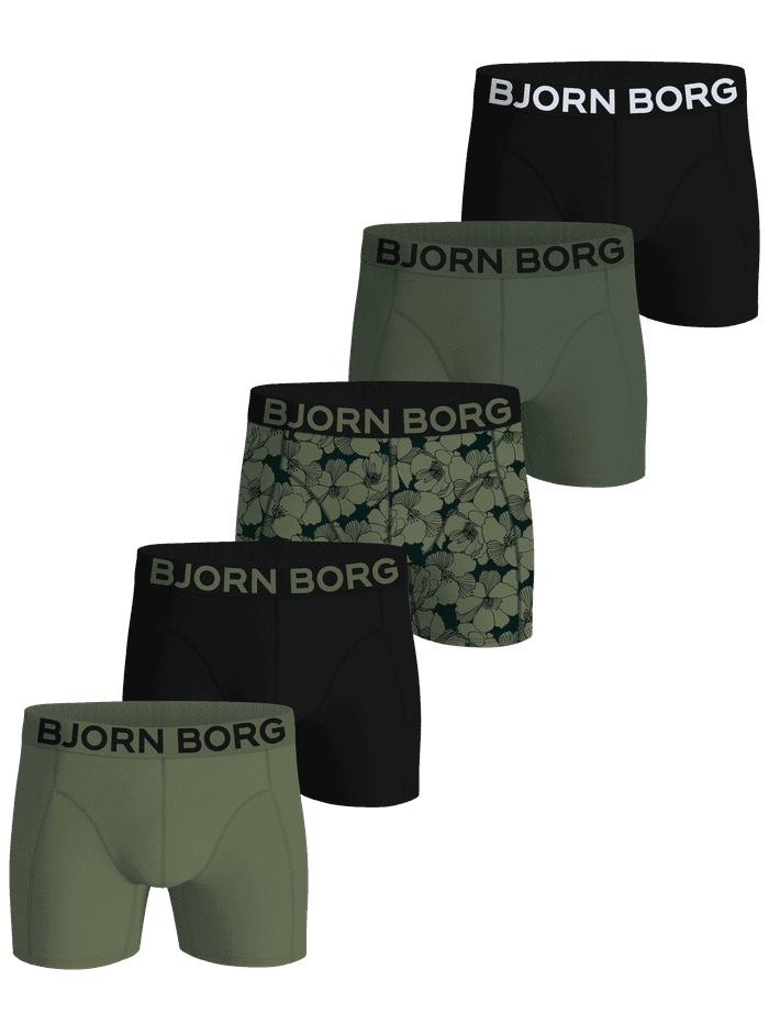 Flat lay of the Organic Cotton Stretch Boxers 5-pack in black, green, and a floral print, showcasing the elastic waistbands.
