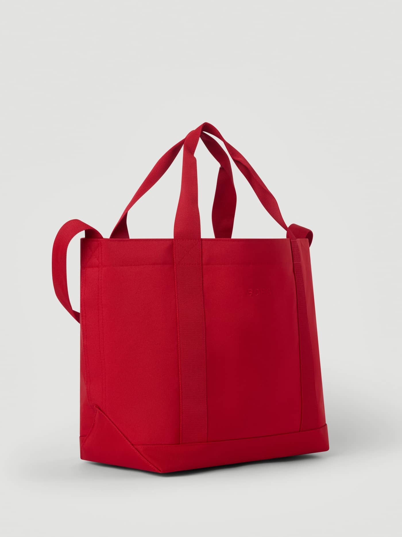 Borg Day To Day Tote M - 17L in Samba (Red) featuring fixed handles and a shoulder strap for training sessions. - Image 2