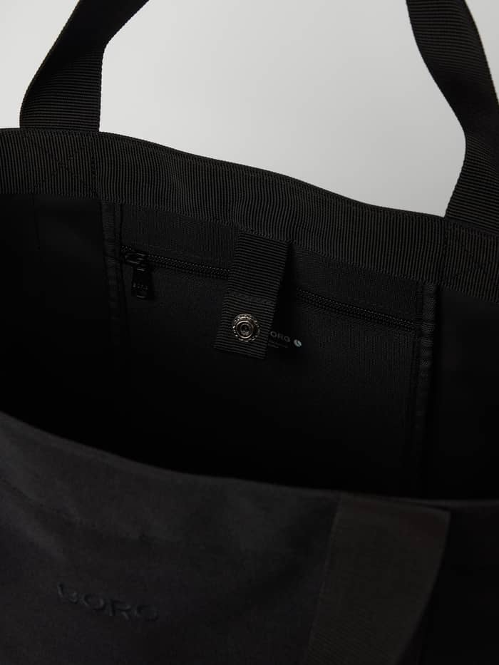 Interior of the Borg Day To Day Tote M - 17L in Black Beauty (Black) featuring a snap button and zip pocket for training. - Image 4