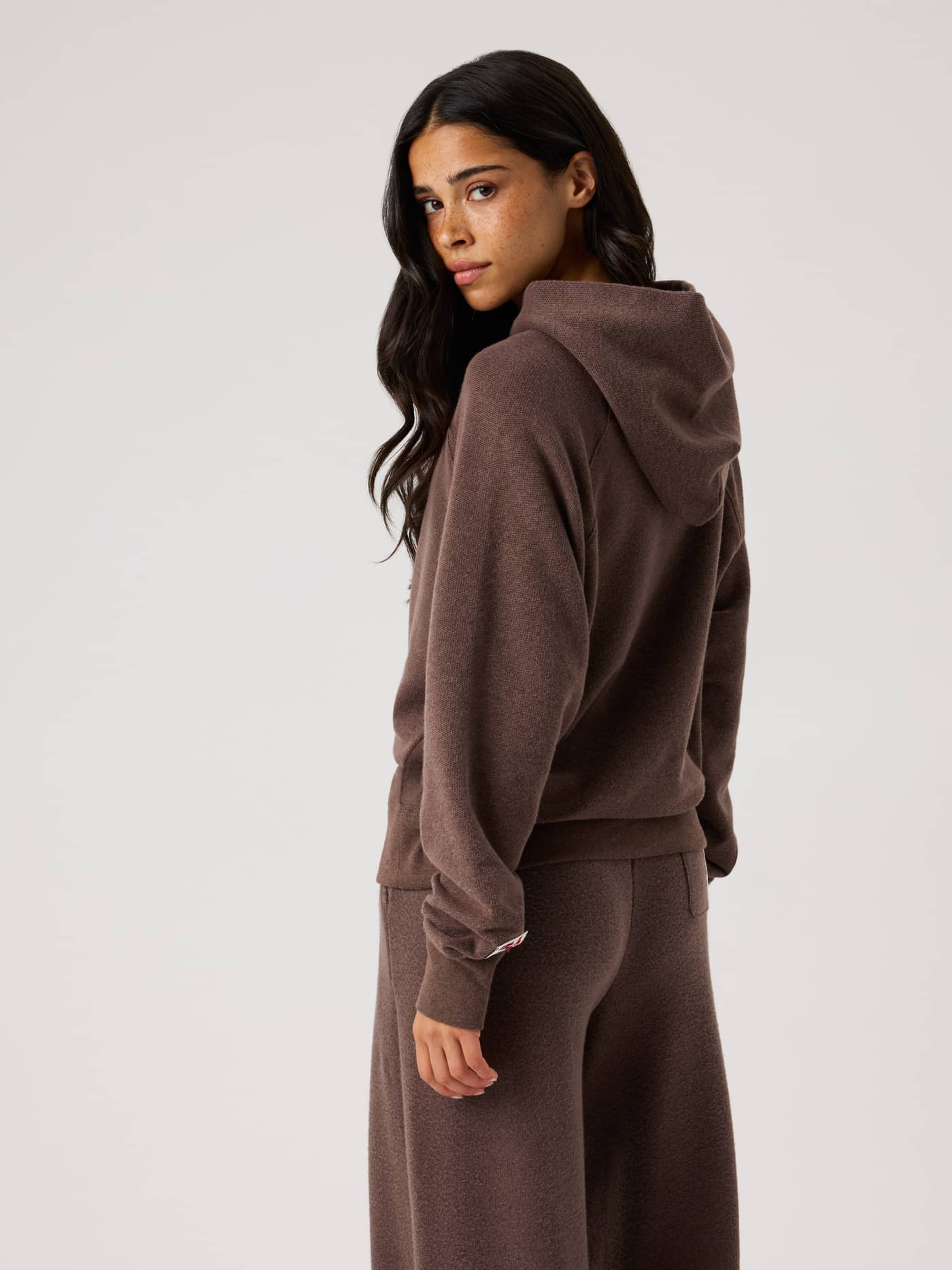 Back view of the Studio French Terry Oversized Hoodie in Brown Melange (Brown) with a soft, relaxed fit for studio warm-ups. - Image 3