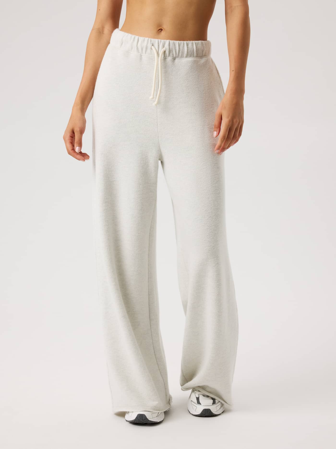 Front view of the Björn Borg Studio French Terry Oversized Sweatpants in Tofu Melange (Beige) featuring a relaxed fit. - Image 2