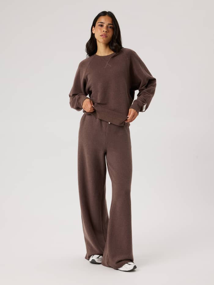 Studio French Terry Oversized Sweatpants in Brown Melange (Brown) for a relaxed fit, shown in a full-body front view.