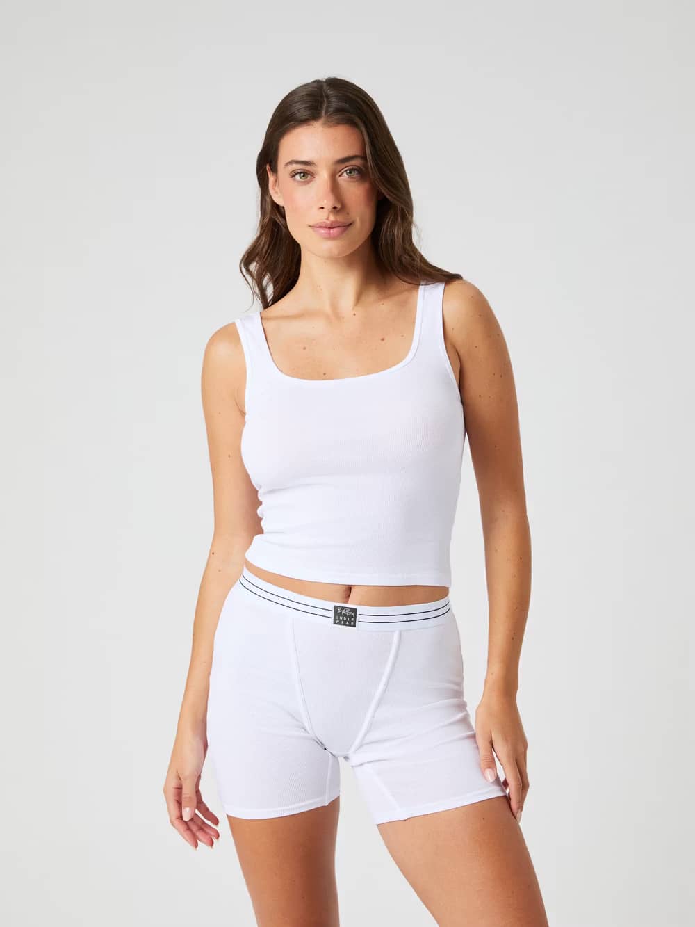 Front view of a model wearing the Björn Borg Core Original Rib Tank in Brilliant White (White) with a slim, ribbed fit. - Image 4