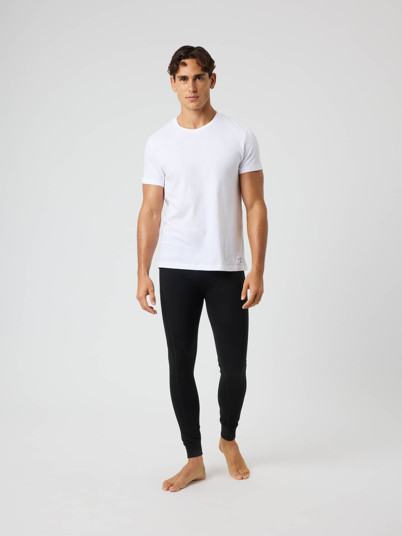 Full-body front view of a model wearing the Bamboo Cotton Blend Long John 1-pack in Black for a premium, comfortable fit. - Image 3