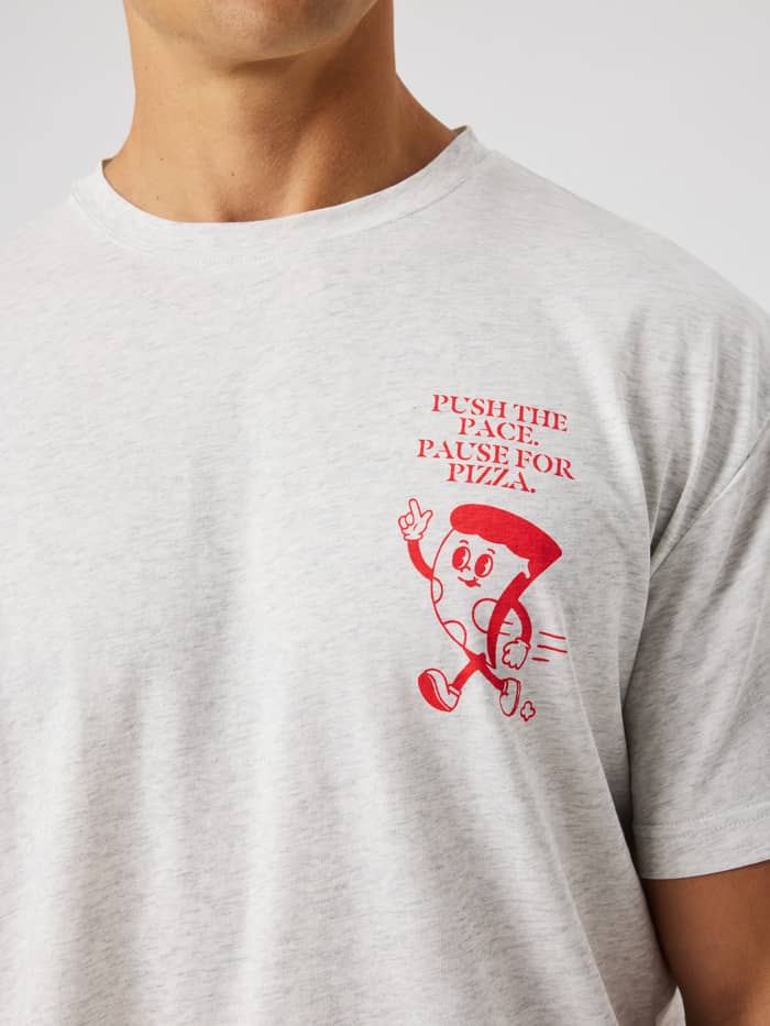 Close-up of the Borg Gym Oversized T-Shirt in Ultra Light Grey Melange (grey) showing the red chest graphic for training.