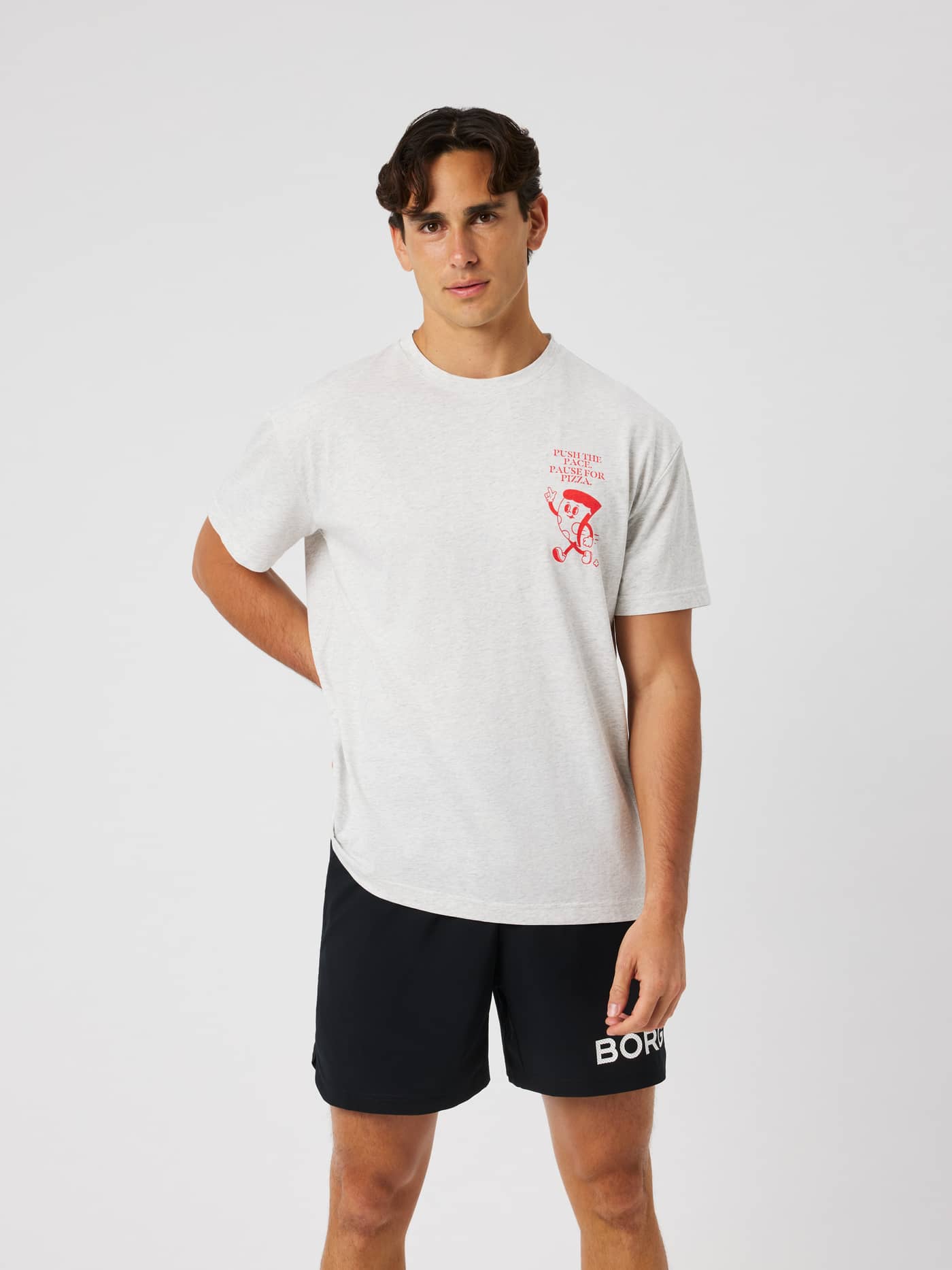 Model wearing the Borg Gym Oversized T-Shirt in ultra light grey melange (grey) for training. - Image 1