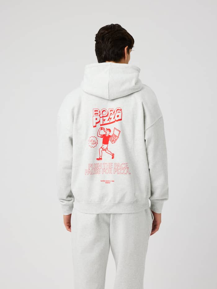 Back view of the Borg Oversized Hoodie in Ultra Light Grey Melange (Grey) featuring a red graphic print and text on the back.