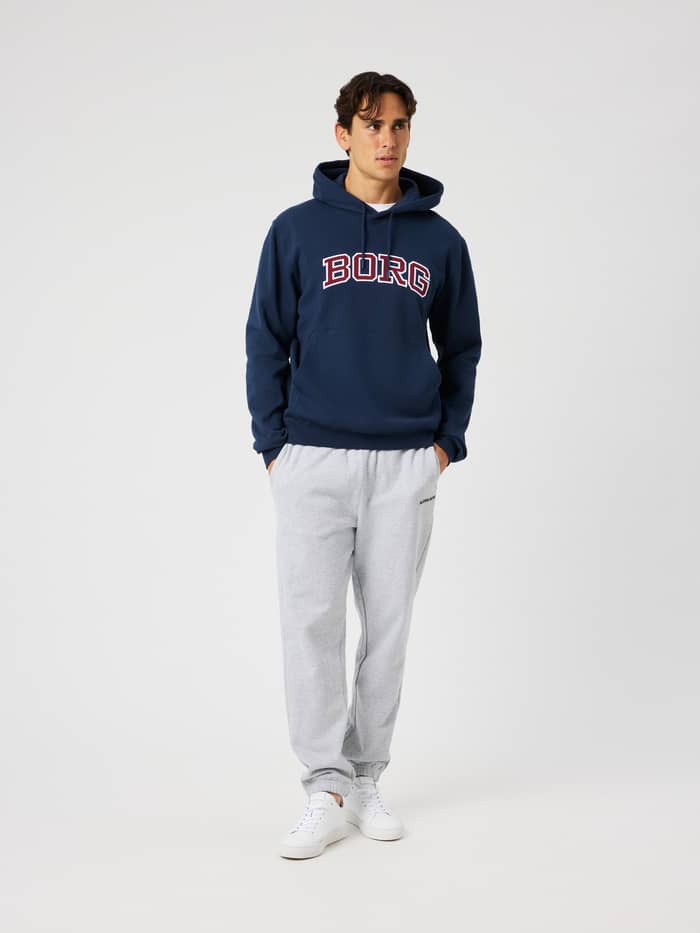 Front view of the Borg Classic Print Hoodie in Dress Blues (Blue) featuring a red and white chest logo print.