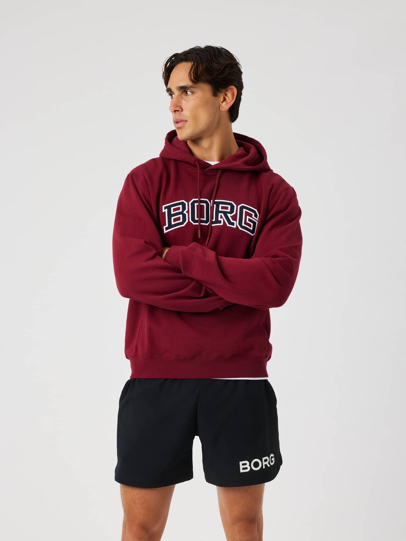 Front view of the Borg Classic Print Hoodie in Cabernet (Burgundy) with a white and black logo print. - Image 1
