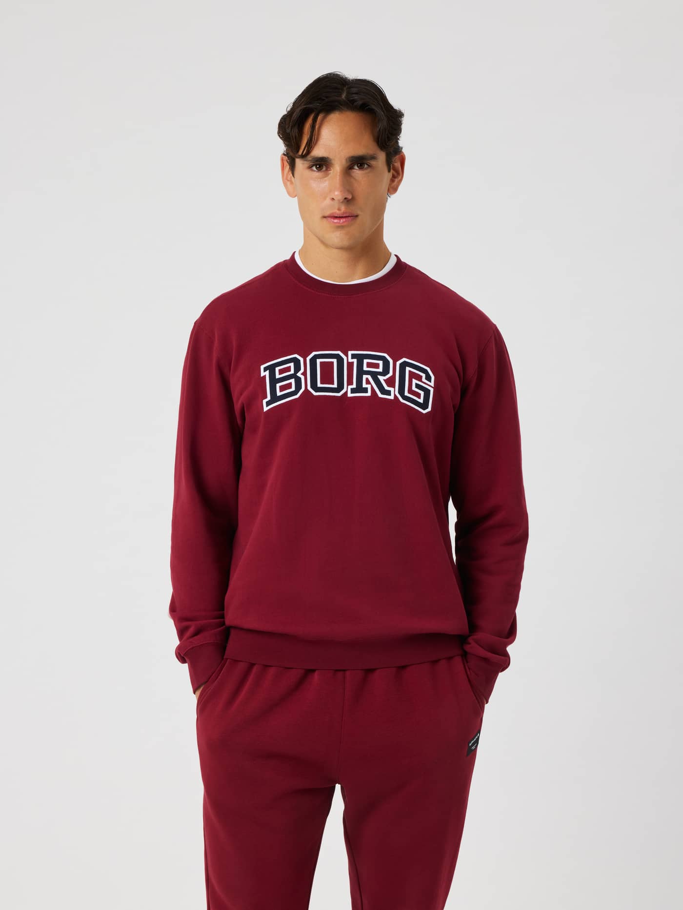 Front view of the Borg Classic Print Sweatshirt in cabernet (red) featuring a white and navy BORG logo across the chest. - Image 1