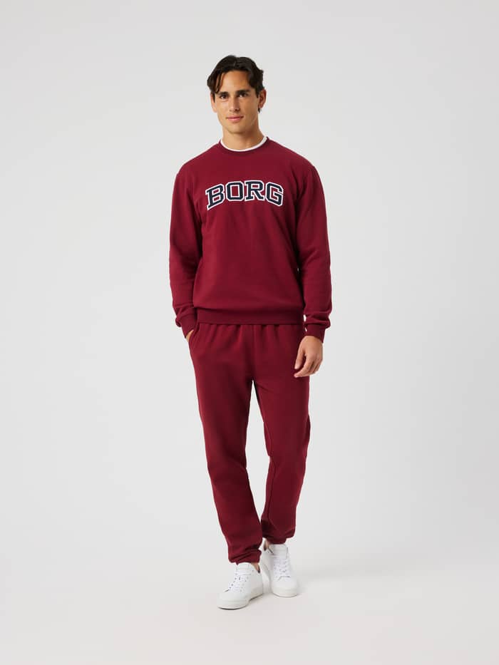 Front view of the Borg Classic Print Sweatshirt in Cabernet (Red) featuring a bold white and navy BORG logo across the chest.