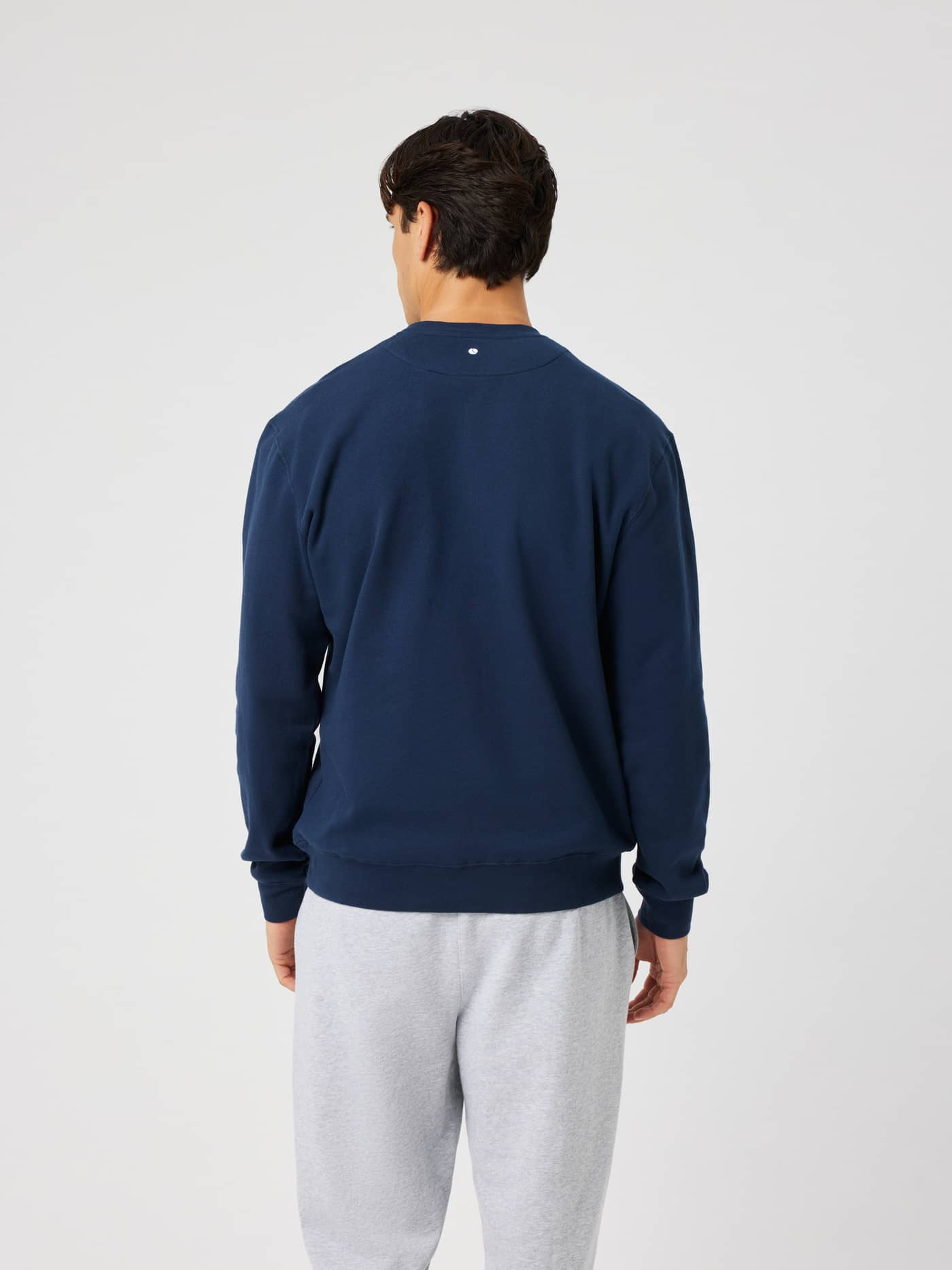 Back view of the Borg Classic Print Sweatshirt in Dress Blues (Navy) worn by a model. - Image 3