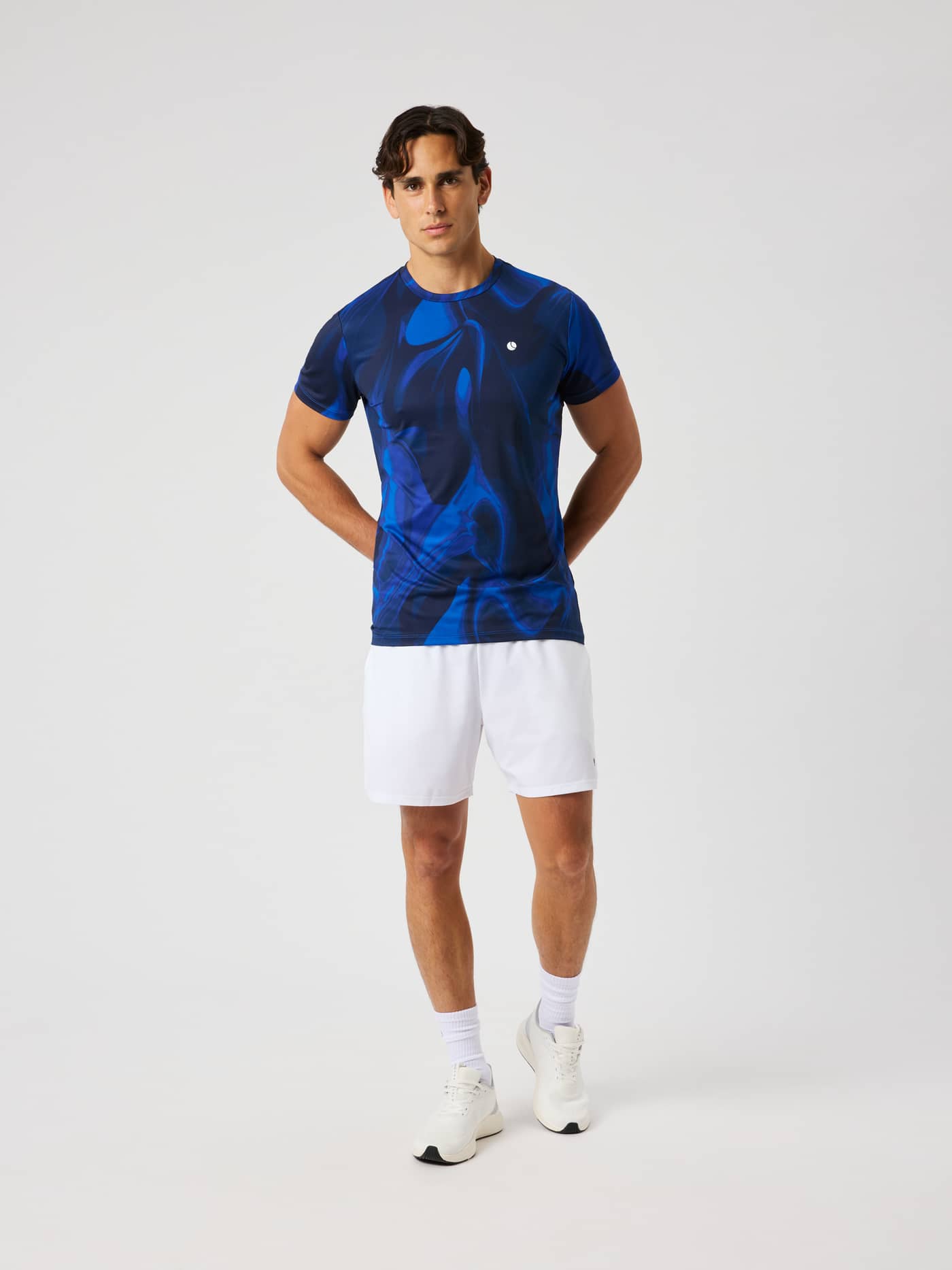 Ace Printed T-Shirt in blue with an abstract wave pattern and a white logo for tennis. - Image 3