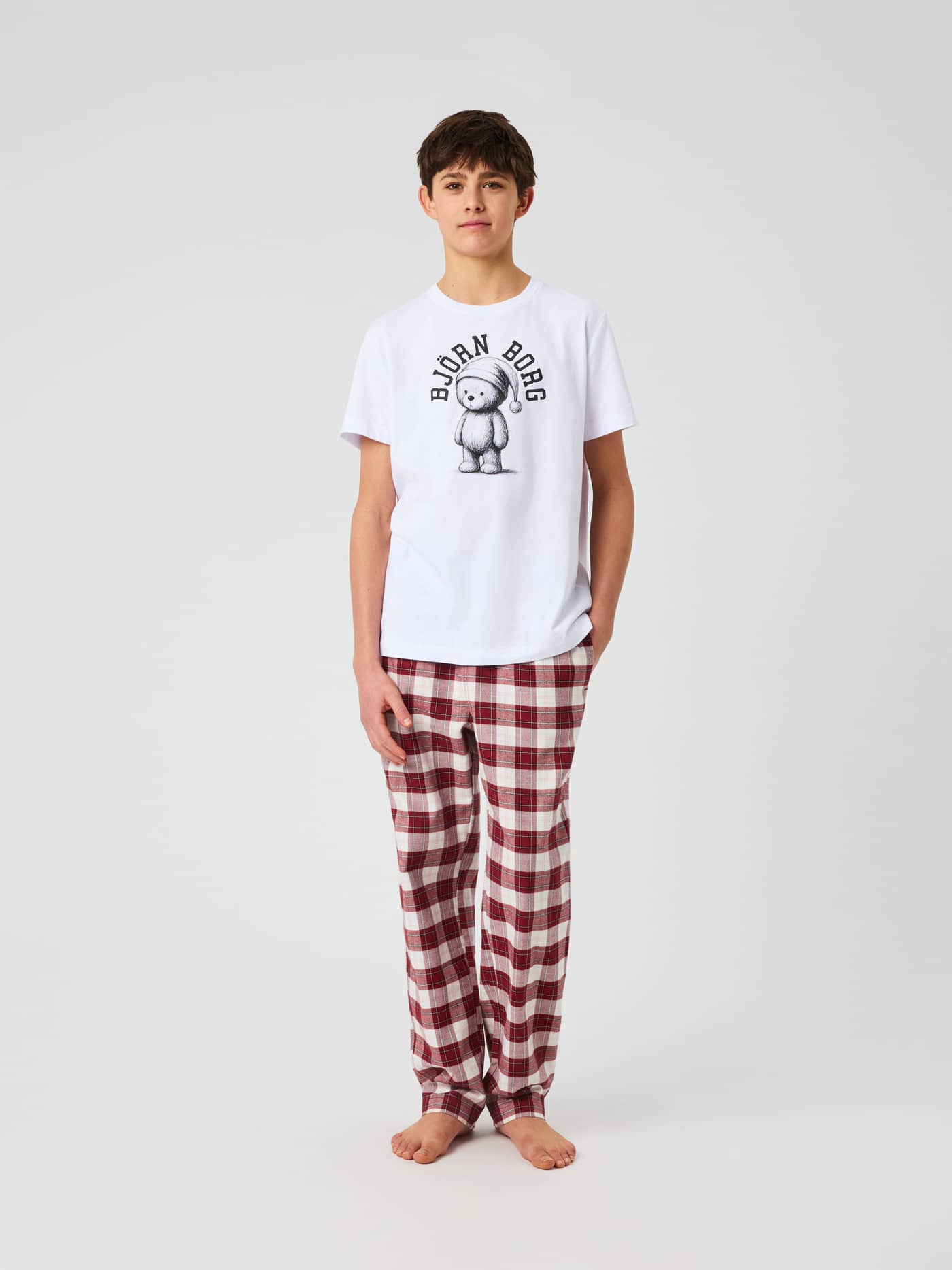 Front view of the Core Loungewear T-Shirt in Brilliant White featuring a graphic print. - Image 3
