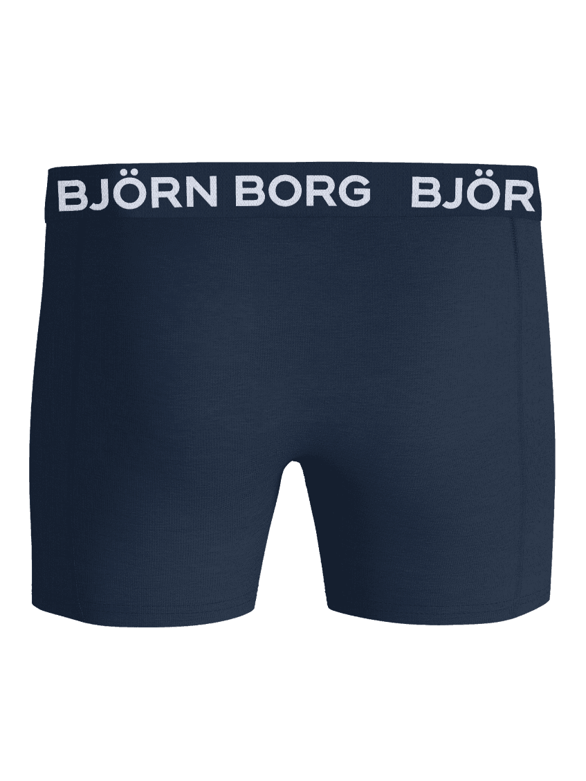 Front view of the Cotton Stretch Boxers 7-pack featuring a dark blue body and a white logo on the elastic waistband. - Image 3