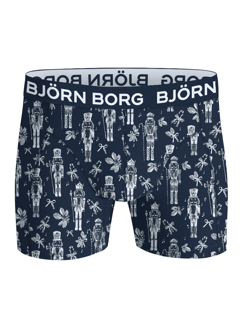 Front view of the Cotton Stretch Boxers 7-pack featuring a nutcracker print and white elastic waistband with the logo. - Image 6