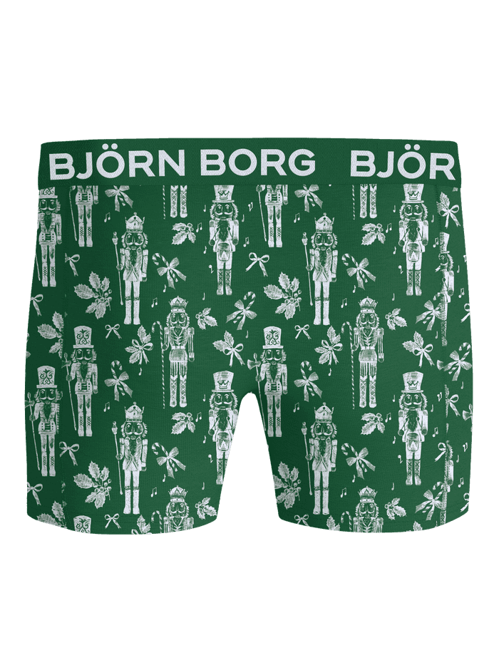 Front view of green printed boxer briefs with a white pattern and logo waistband.