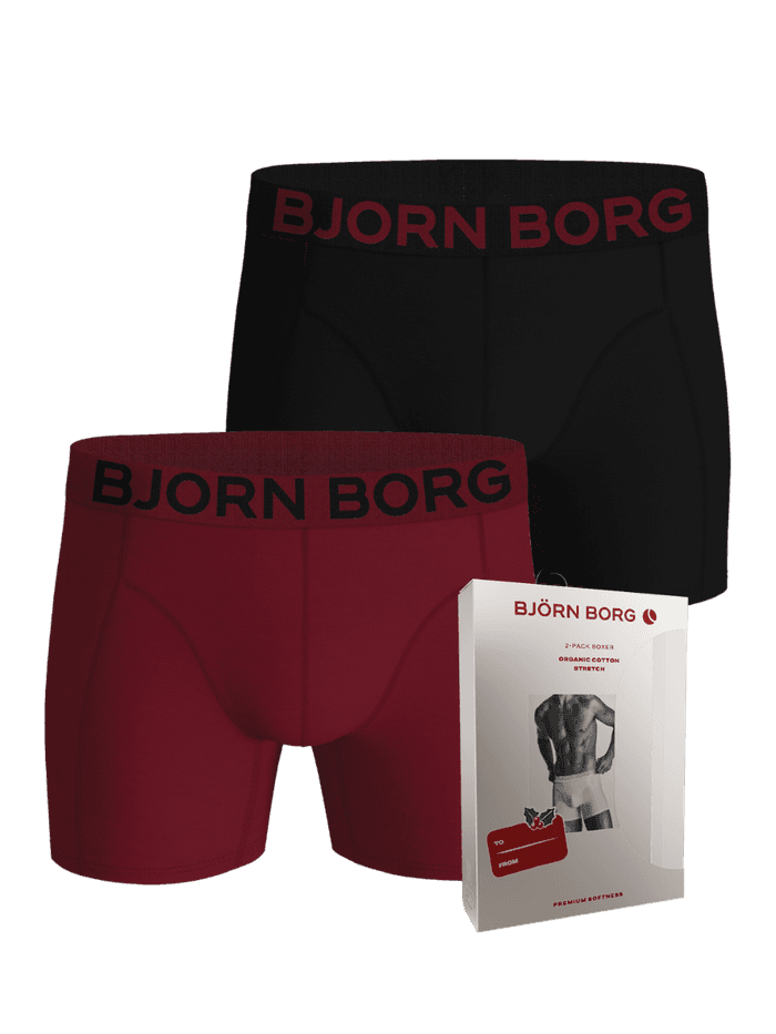 Organic Cotton Stretch Boxer Briefs 2-pack in black and red alongside their holiday packaging.