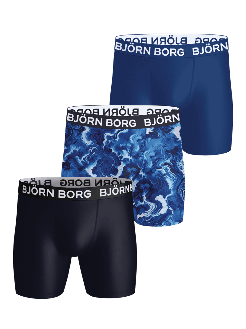 Front view of the Sports Microfiber Boxer 3-pack featuring blue and patterned boxer briefs with elastic waistbands.