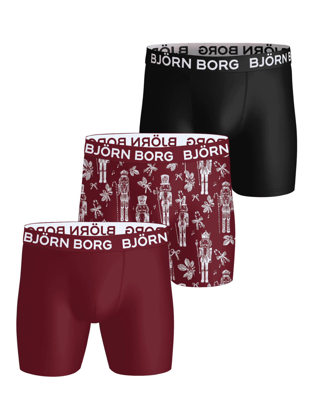 Front view of the Sports Microfiber Boxer Briefs 3-pack featuring black, red, and a nutcracker print style. - Image 1