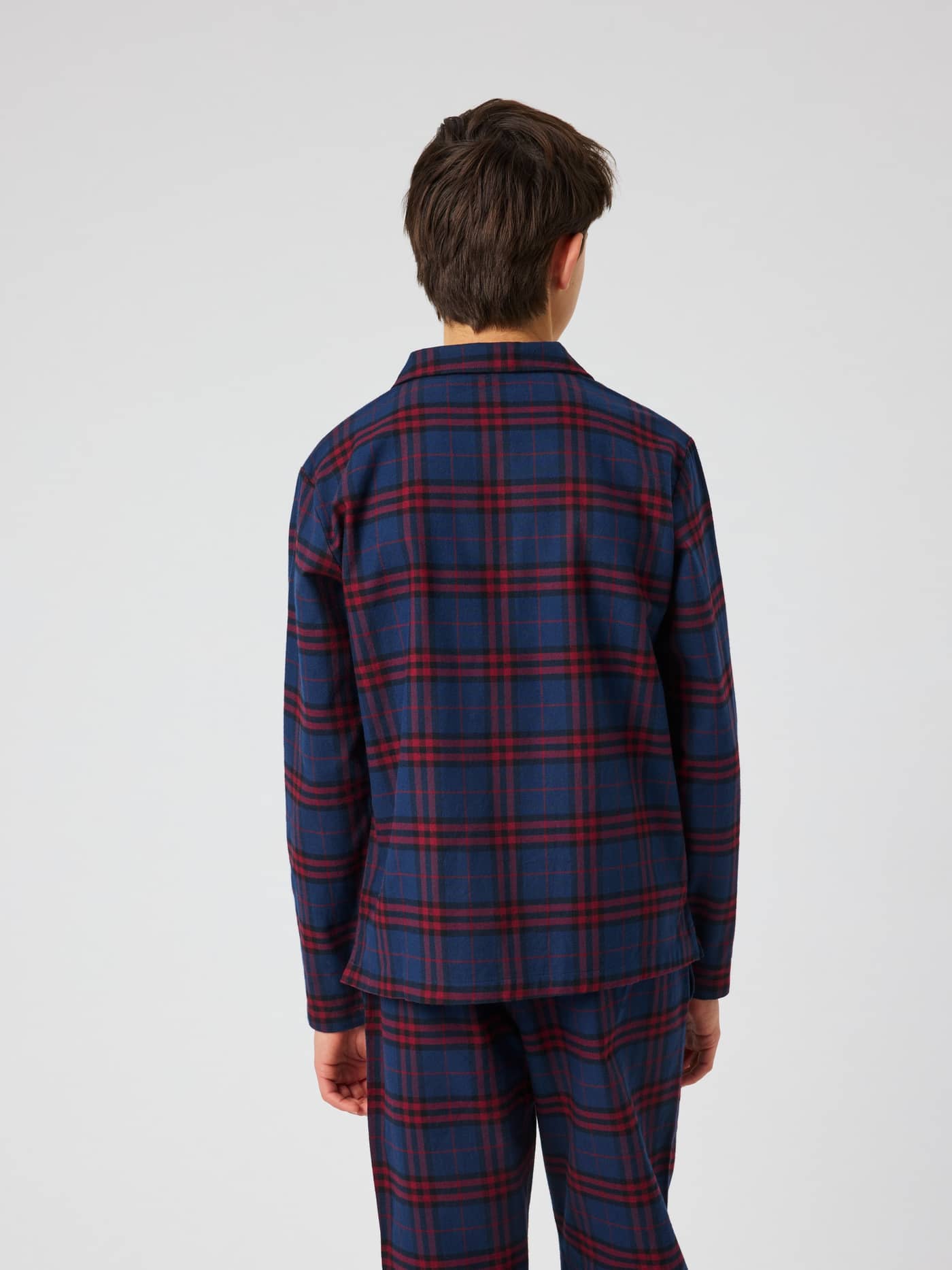 Back view of the Core Flannel Pyjama Set 2-pack for kids featuring a checked pattern in multi colors. - Image 5