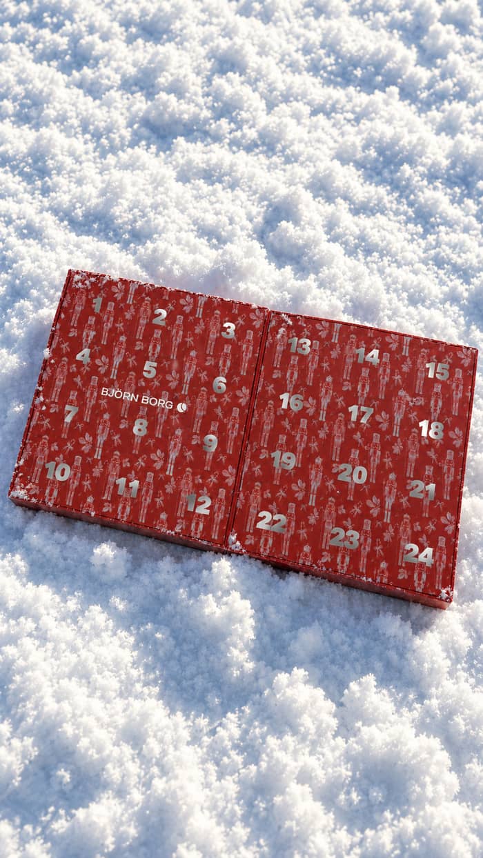 Cotton Stretch Christmas Calender Boxers 24-pack advent calendar in red placed on snow.