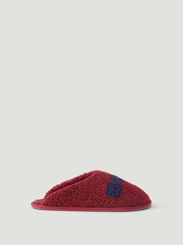 Side view of the Haven Slipper in Cabernet and Peacoat, featuring soft polyester pile and Borg branding on the vamp.