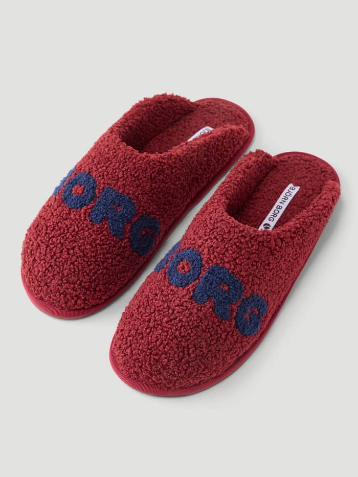 Haven Slipper in Cabernet and Peacoat featuring warm plush pile and blue Borg branding on the vamp.