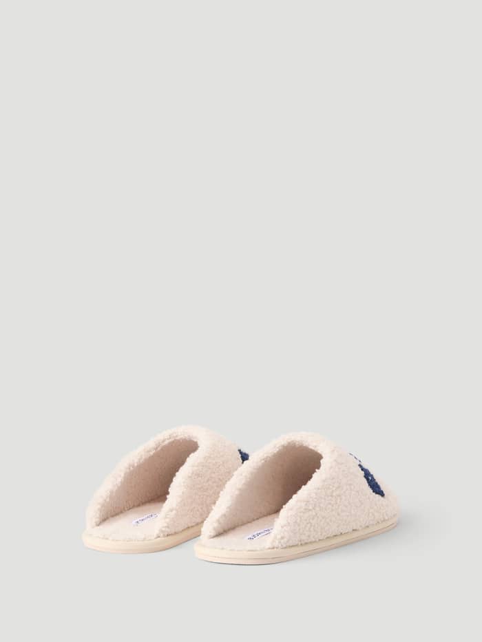 Back view of the Haven Slipper in Tofu and Peacoat showing the warm fleece lining and slip-on design.