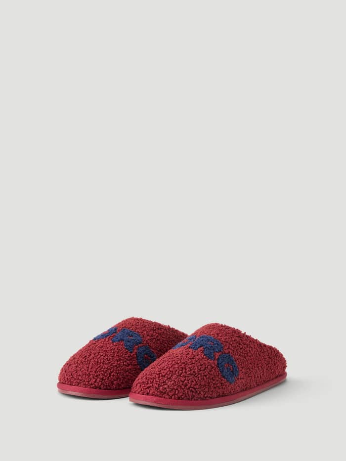 Front view of the Haven Slipper in cabernet and peacoat, featuring soft pile fleece and prominent Borg branding on the vamp.