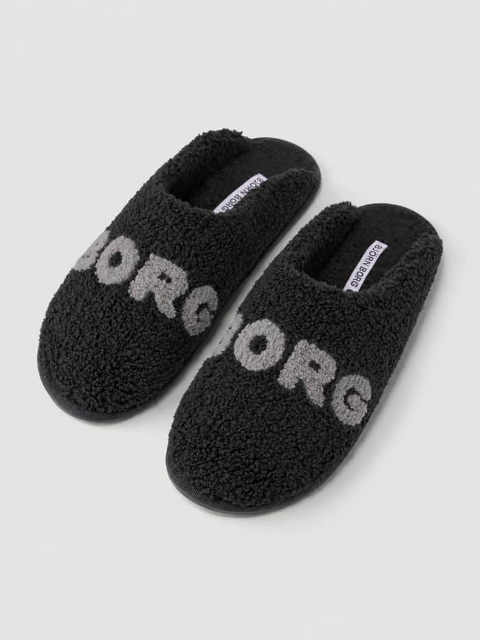 Haven Slipper in Black Beauty (Black) and Quite Shade (Grey) featuring the soft pile finish and Borg branding on the vamp.