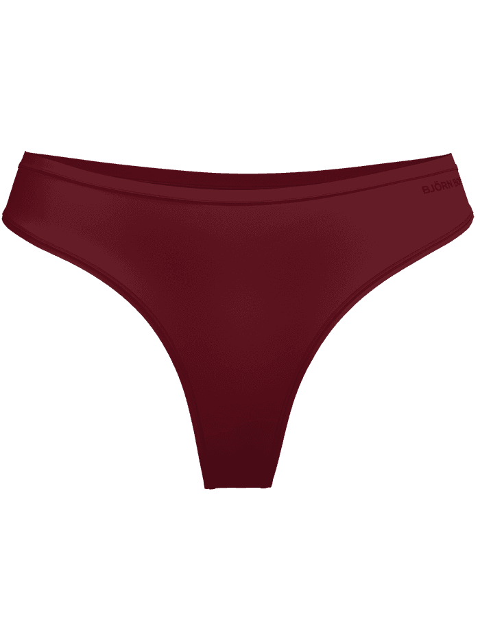Front view of the red Comfort Thongs 2-pack showing the mid-rise waist and tonal Björn Borg logo at the hip.