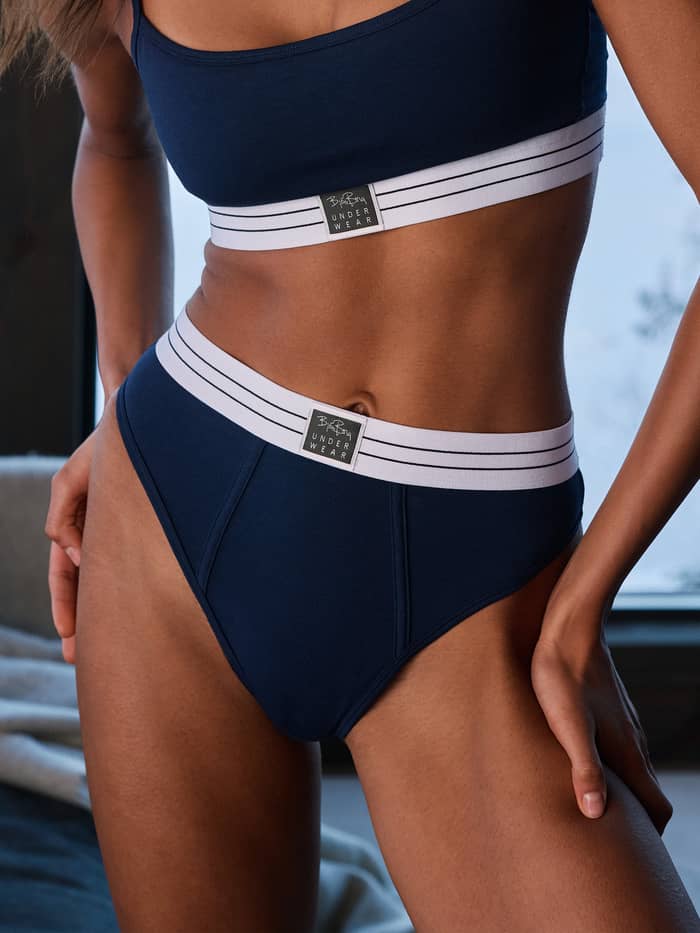 Close-up of the Original Briefs 2-pack in blue and white, featuring a striped elastic waistband with a front logo.