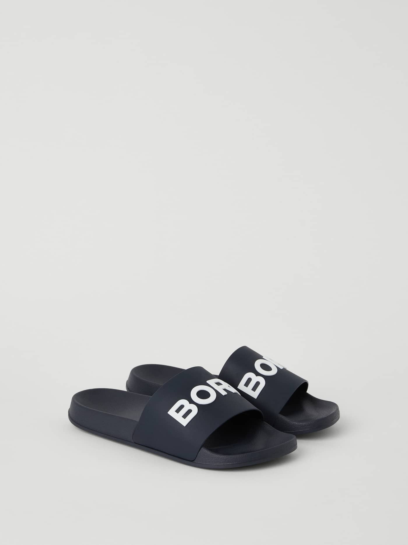 Navy Men’s Sandal Knox in flexible TPU rubber with a white Borg logo, shown in an angled studio view. - Image 1