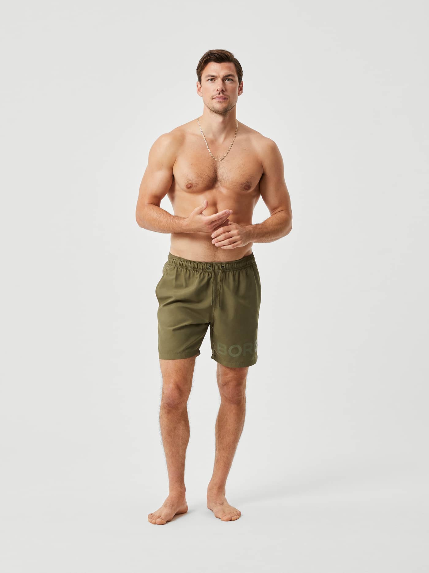 Borg Swim Shorts in Kalamata (Grün) in der Vorderansicht mit tonalem BORG-Logo am Bein für Style und Funktion. - Image 1