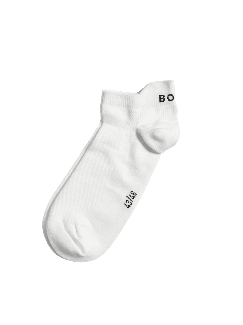 Side view of the Brilliant White (White) Sports Ankle Socks 2-pack in recycled microfibre with a black logo for training.
